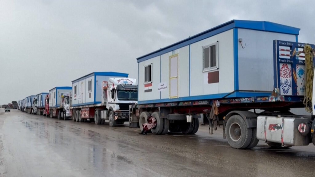 Bulldozers and trucks carrying mobile homes seen entering Gaza