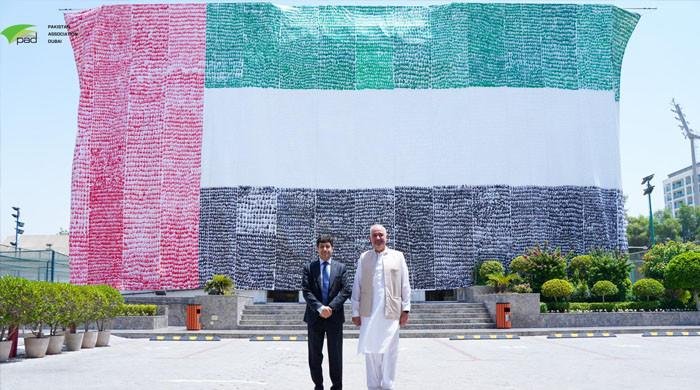 Pakistan achieves Guinness world record for largest UAE handprinted flag in Dubai