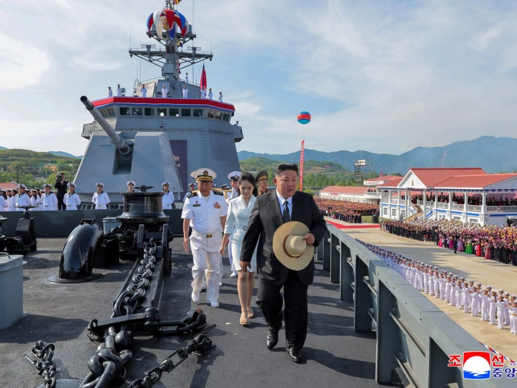 N Korea’s Kim eyes more warships as damaged destroyer relaunched | Kim Jong Un News