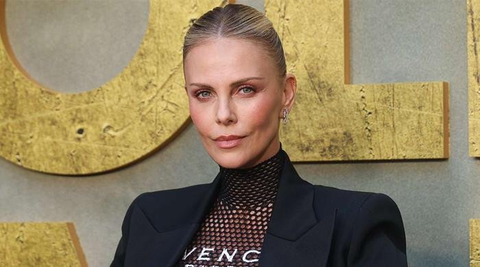 Charlize Theron receives praise from ‘The Old Guard 2′ director