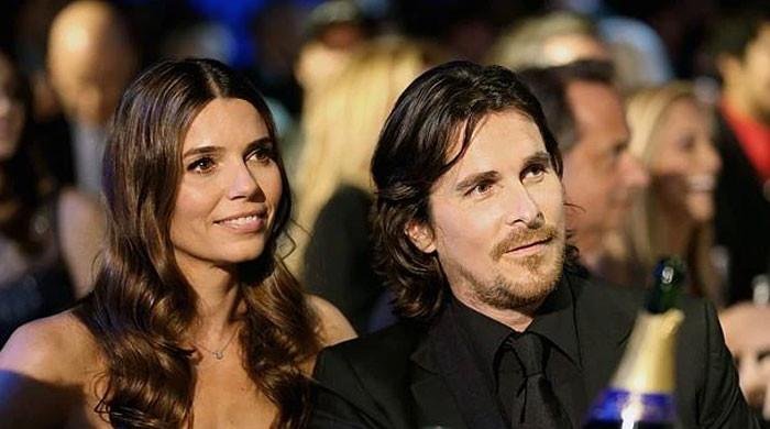 Christian Bale steps out in spotlight with family