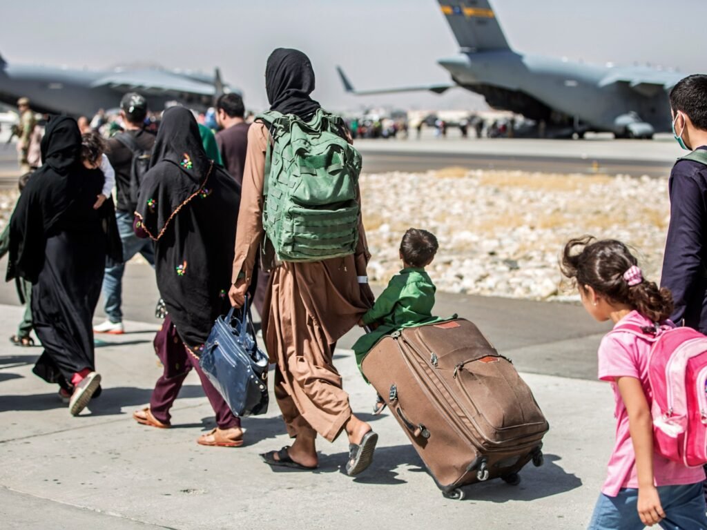 Afghans in US mark Taliban Kabul takeover amid Trump immigration crackdown | Donald Trump News