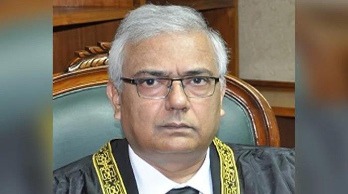 Who is Justice Aminuddin Khan, first CJ of newly-formed FCC?