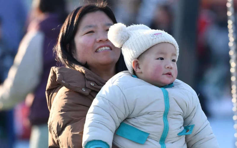 China announces five-year plan to support families, boost births