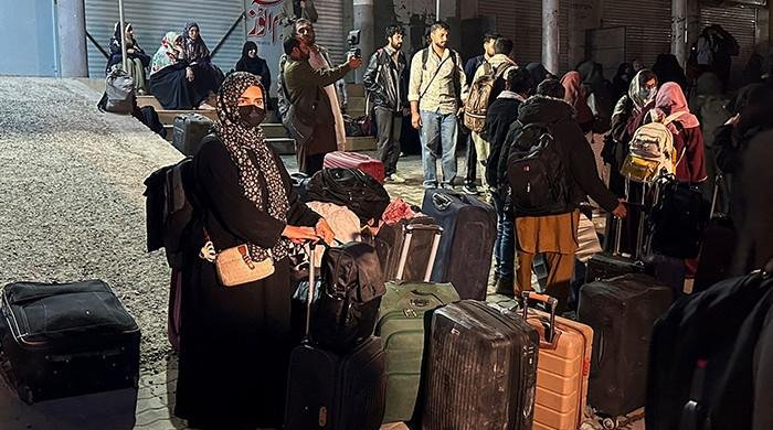 Pakistanis fleeing Iran describe strikes shaking ground under their feet