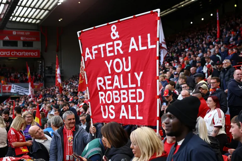 Which banners did Liverpool fans display at Anfield against Man City?